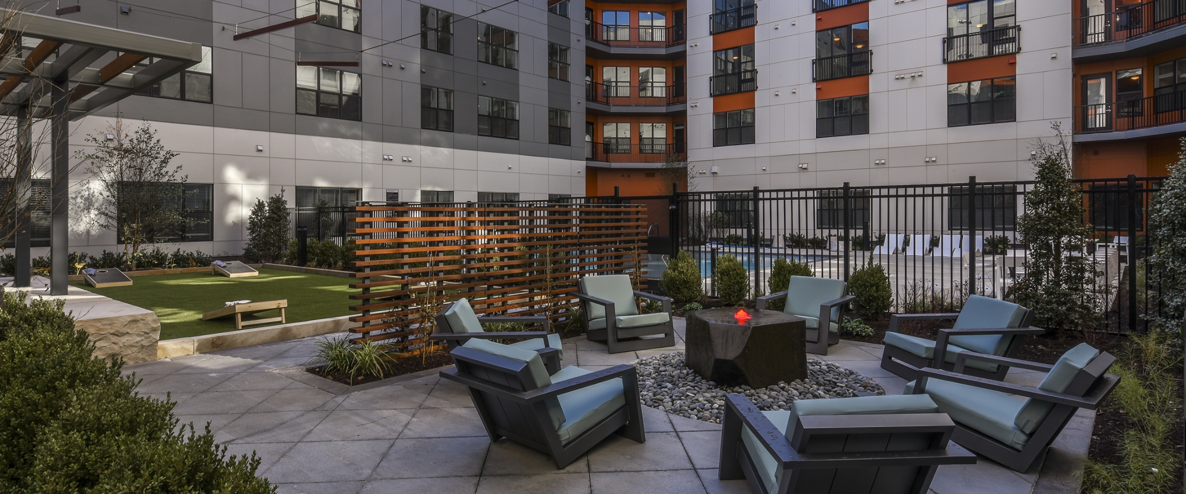 Courtyard with patio furniture and fireplace at our apartments for rent in Federal Hill.