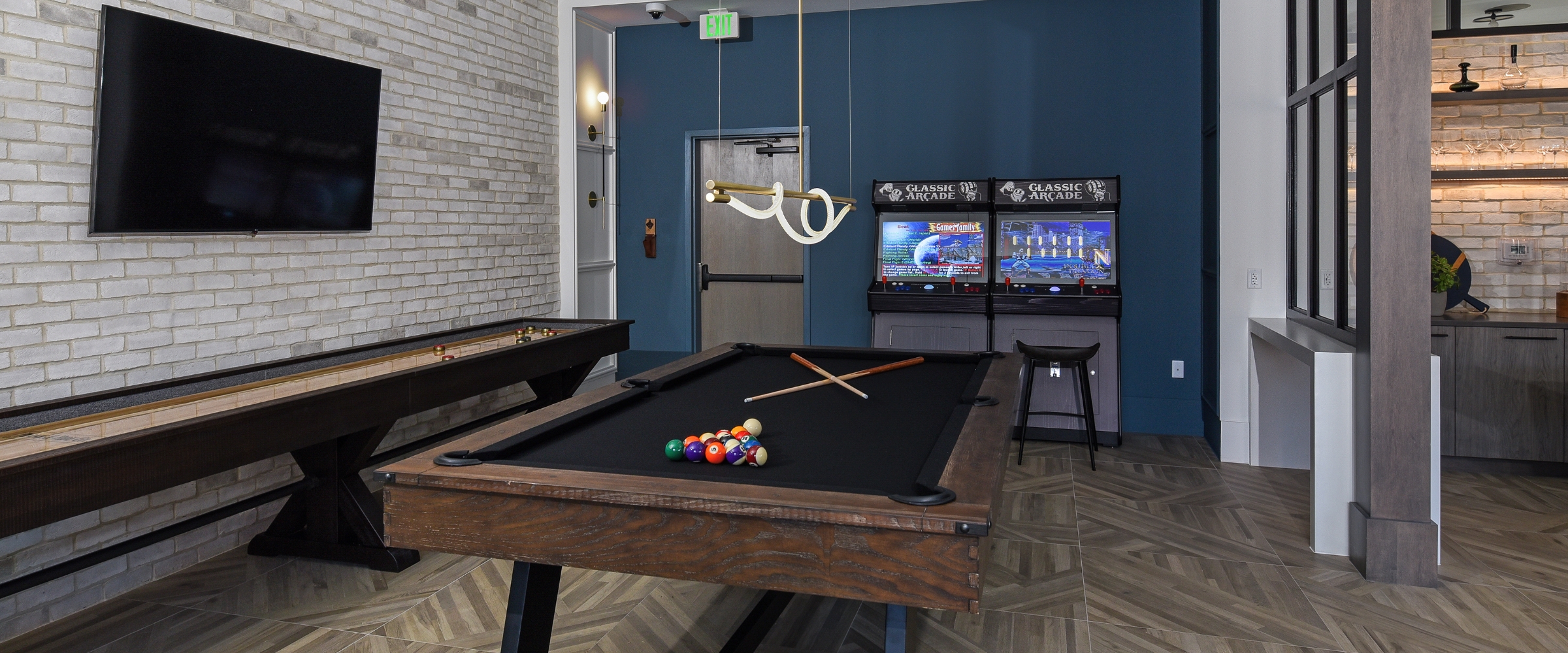 Clubhouse with pool, shuffleboard, and more at our South Baltimore apartments.