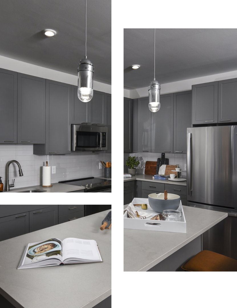 Kitchen with modern lighting at our new apartments in Baltimore, MD.
